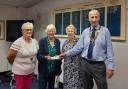 Left to right: In the photo left to right: Cllr Christine Burgess, deputy mayor of Epping Town Council, Liz Jones, Valerie Lal and Vince Marsh, president of Rotary Club of Epping presenting the cheque. Picture: Epping Town Council