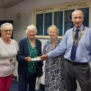 Left to right: In the photo left to right: Cllr Christine Burgess, deputy mayor of Epping Town Council, Liz Jones, Valerie Lal and Vince Marsh, president of Rotary Club of Epping presenting the cheque. Picture: Epping Town Council
