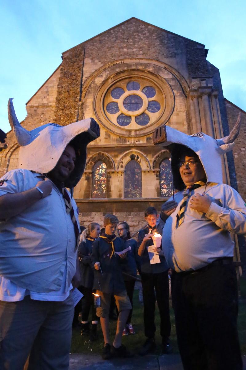 Holy Cross processions through Waltham Abbey to the Abbey Church, gathering in the Abbey cloisters for a short service, fireworks and cheese and wine in church. Essex. (13/9/2014) EL79249