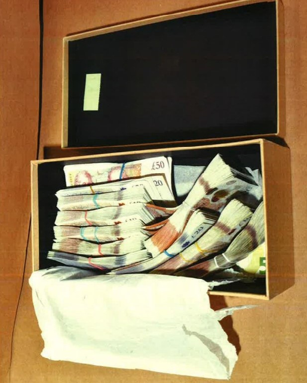 Cash found at the home of Ioan Gherghel. Photo: Met Police