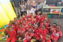 Gambian school children with Chris Bialan (British sponsor) and Julie Maio
