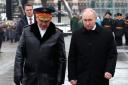 Russian President Vladimir Putin, right, and defence minister Sergei Shoigu take part in a wreath-laying ceremony at the Tomb of the Unknown Soldier in Alexander Garden on Defender of the Fatherland Day, in Moscow, Russia (Alexander Kazakov, Sputnik,