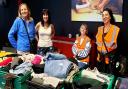 Volunteers with some of the goods on sale at the new Waltham Abbey shop