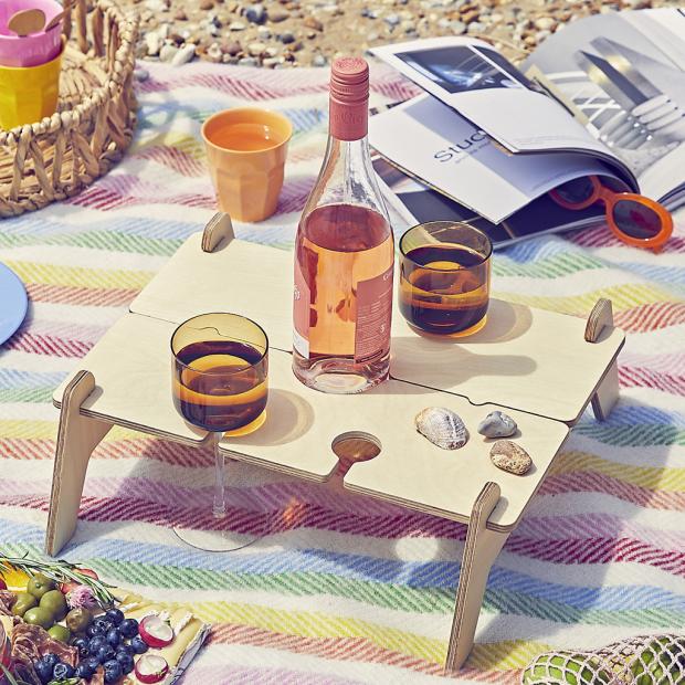 Epping Forest Guardian: Personalised Portable Picnic Table Wine Holder. Credit: Not On The High Street