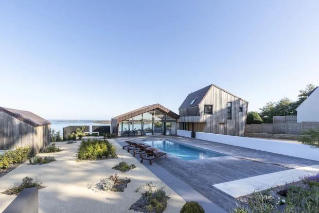 Epping Forest Guardian: Modern villa with stunning sea views, swimming pool, Jaccuzi - Brittany, France. Credit: Vrbo