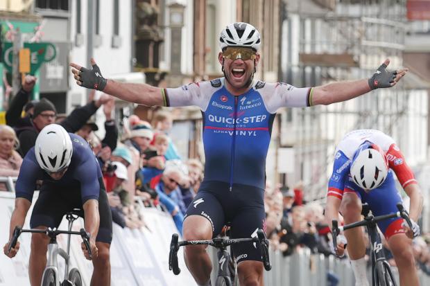 Mark Cavendish celebrates his victory. Picture: PA