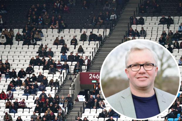 Empty seats in the West Ham United stand as fans leave early during the  match against Arsenal at the London Stadium (Image: PA)