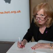 Epping Forest MP Dame Eleanor Laing signing the Holocaust Educational Trust’s Book of Commitment. Credit: Dame Eleanor Laing MP