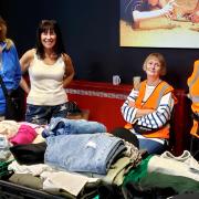 Volunteers with some of the goods on sale at the new Waltham Abbey shop