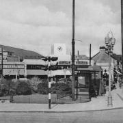 A nostalgic picture of Albert Crescent in South Chingford c1936 showing the Odeon Cinema, ornate street lanterns, a police box, drinking fountain, gardens and WC
