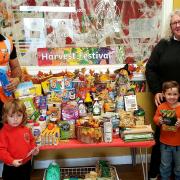 Children from Scribbles Day Nursery with their donations