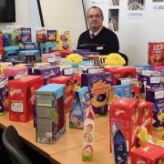 Michael King with the Easter Eggs he collected for a children's hospital earlier this year.
