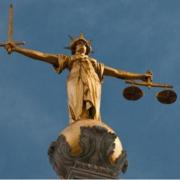 Woman subjected neighbour to racist and homophobic abuse