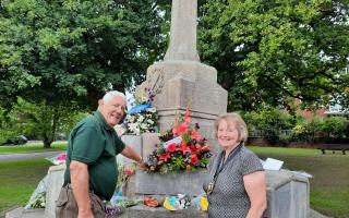 Town supervisor Bill Towers and Epping Town Mayor councillor Barbara Scruton with the floral tribute. Credit: Everything Epping Forest / David Jackman